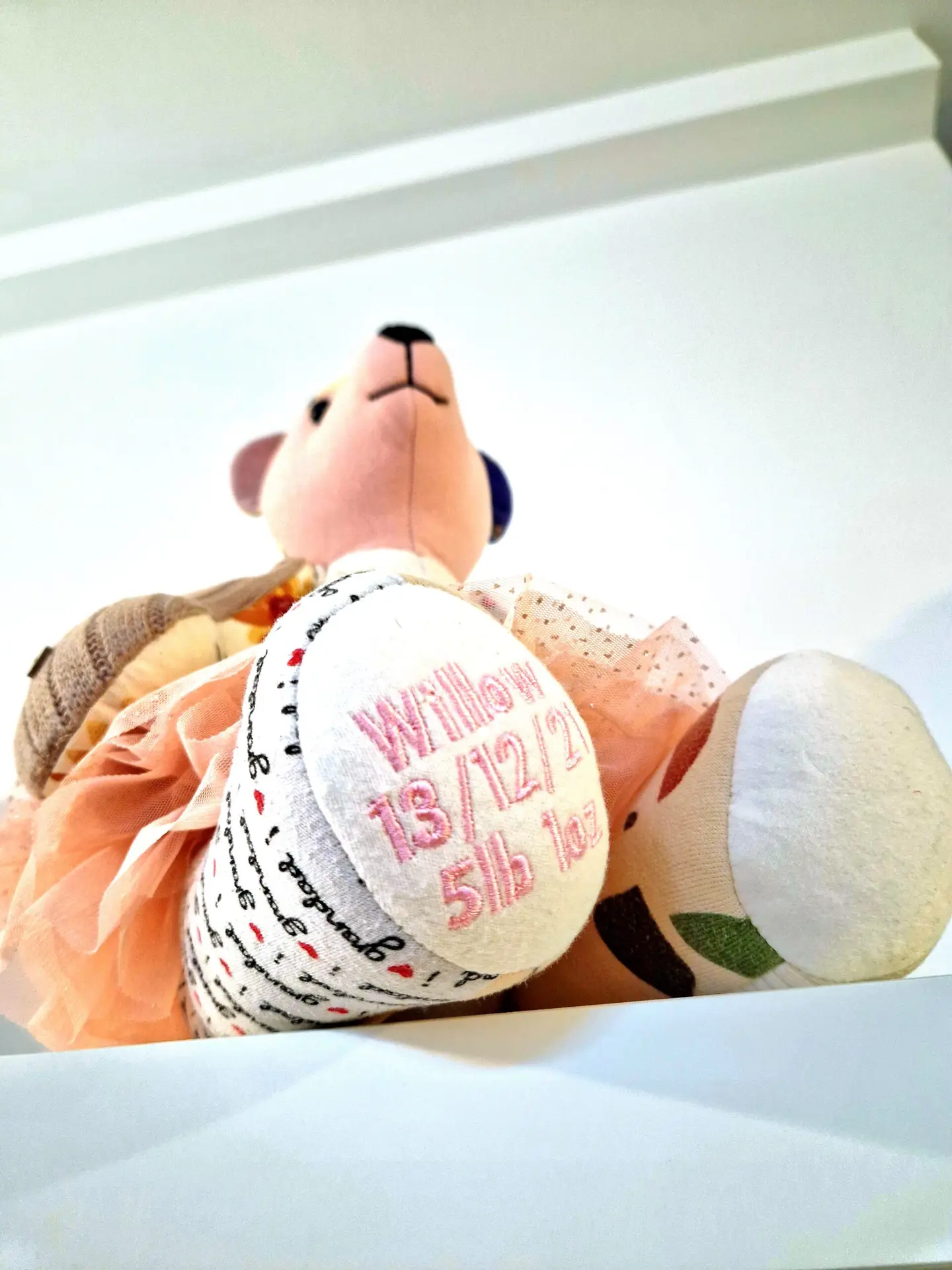 bear made with baby clothes